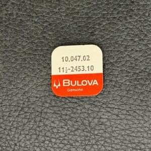 NOS Bulova Watch Part #10.047.02 11 1/2-2453.10. Center Wheel Bridge Screw.